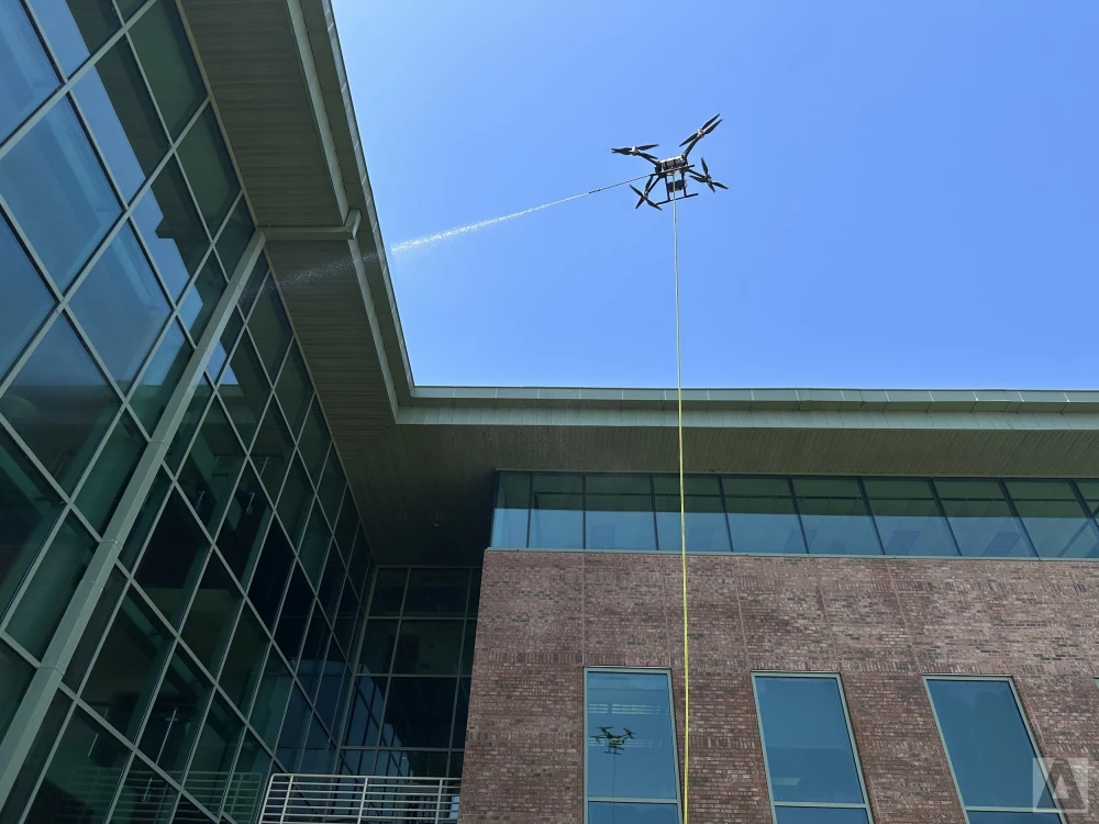 High-rise building drone cleaning